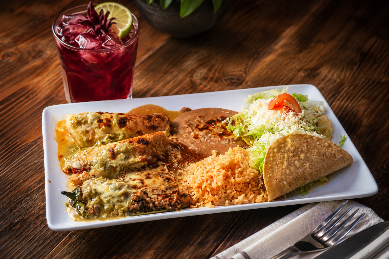 Chiles rellenos plate with rice, beans and jamaica